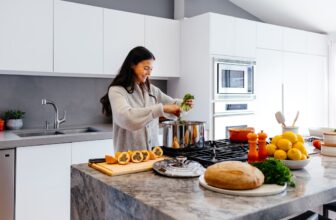 middle aged woman cooking healthy