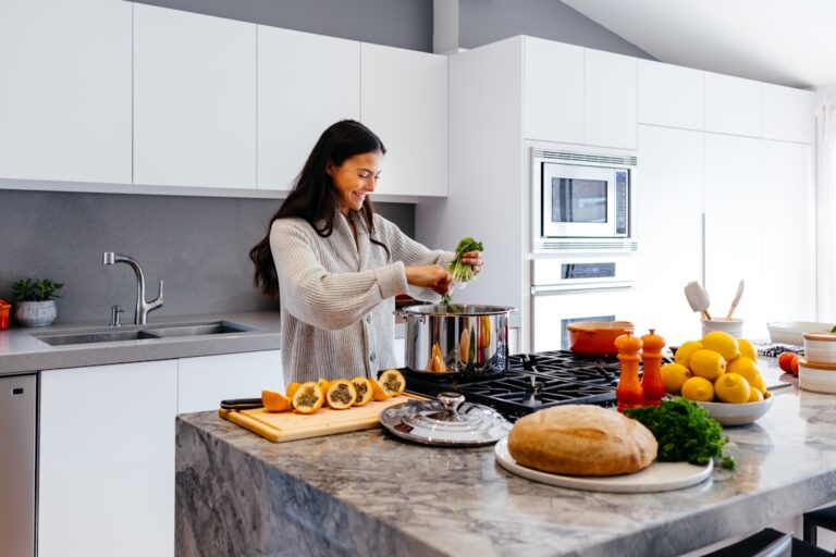 middle aged woman cooking healthy